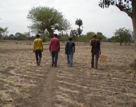 Source - Blake Zachary, The DHS Program/ICF International. Description - Field workers walking to a cluster in Ethiopia.  